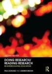 Doing Research/Reading Research - Re-Interrogating Education